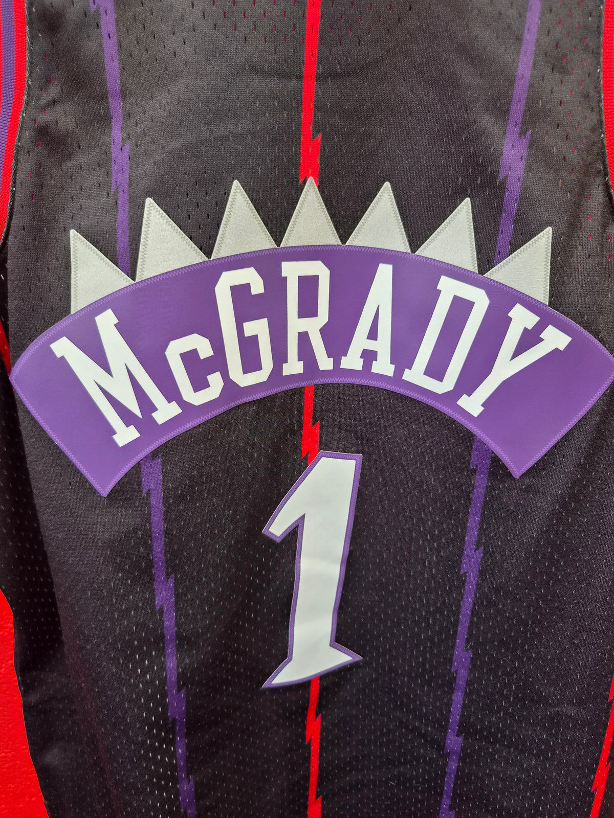 Mitchell & Ness Toronto Raptors 1998-99 NBA Jersey, #1 McGrady, Black, Size Large
