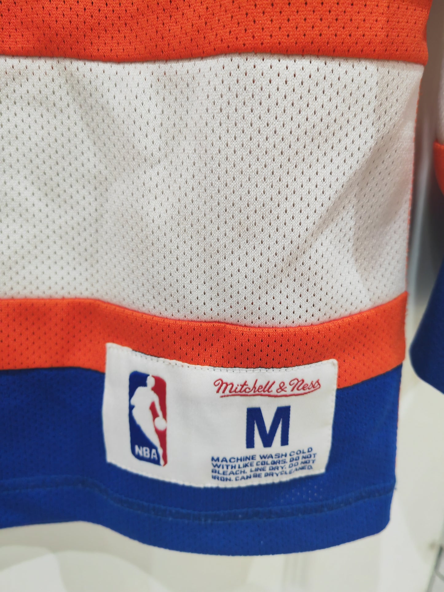 Mitchell & Ness New York Knicks Hockey Style Jersey, Orange/Blue, Size Medium