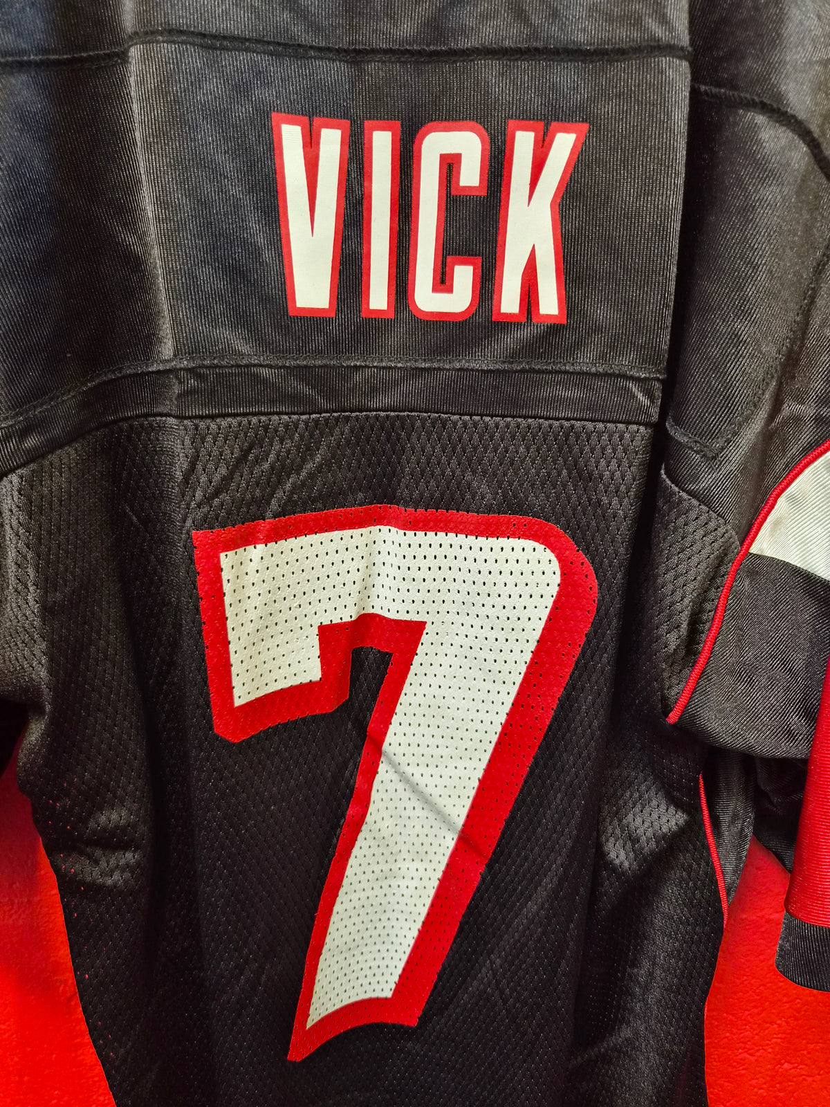 Reebok Atlanta Falcons NFL Jersey, #7 Vick, Black, Size Medium