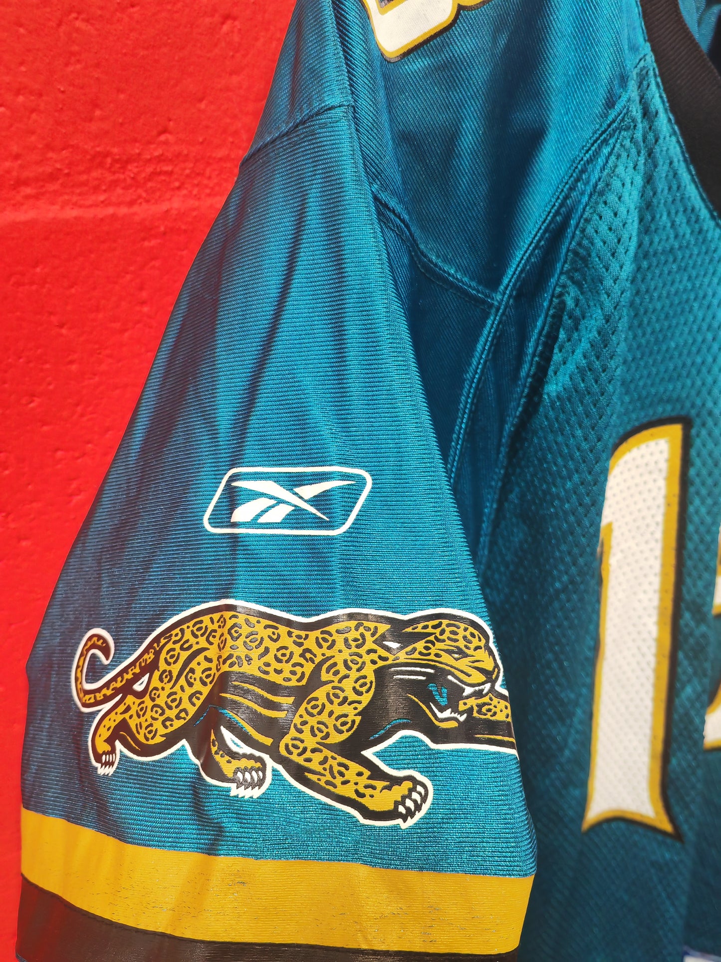 Youth Reebok Jacksonville Jaguars NFL Jersey, #18 M.Jones, Size YL