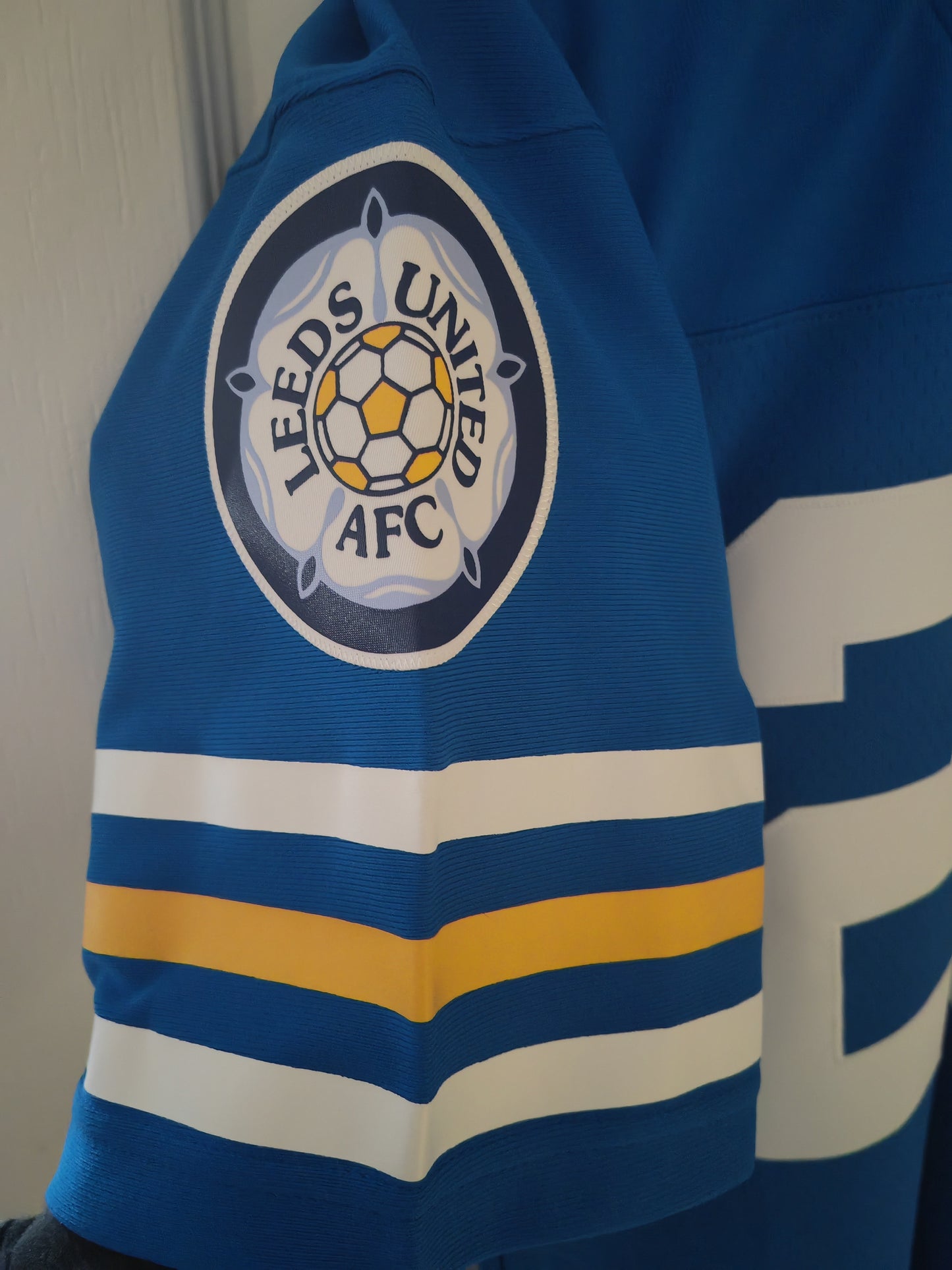 Mitchell & Ness Leeds United NFL Style Jersey, #23, Blue, Size Medium